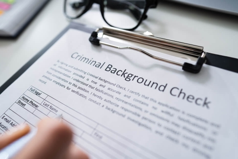 Criminal Background Check Form On Clipboard