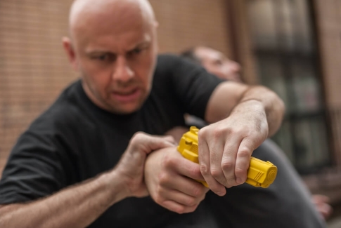 Man Defensively Taking Away Firearm Lrg